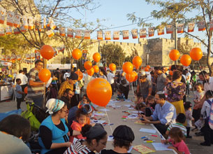 בנק מזרחי-טפחות בע”מ - יריד סוכות ואיסוף מזון בירושלים