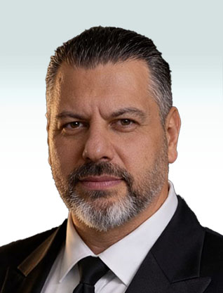 Emanuel  Yuzuk, Yuzuk Malkin & Co.,  Attorneys and Notary